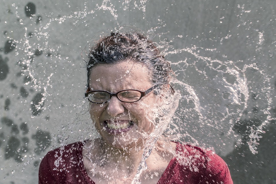 Water splashing on woman's face