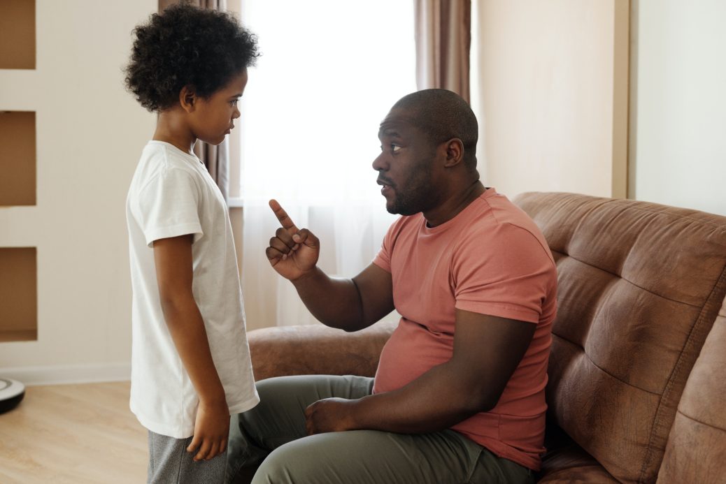Father talking positively to son indicating better parenting skills